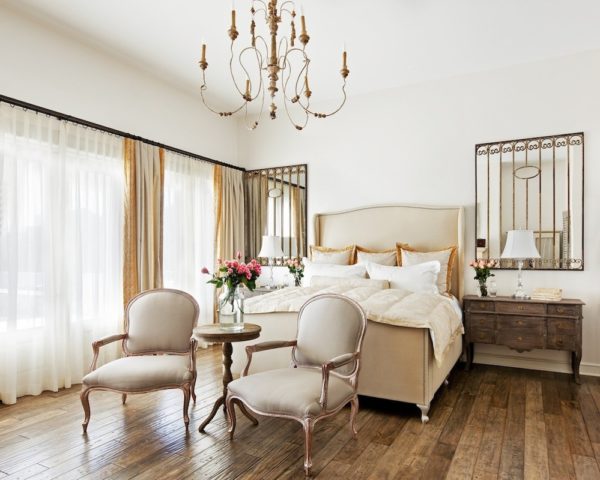 get the elegant look with white sheets and gold chandelier for your bedroom