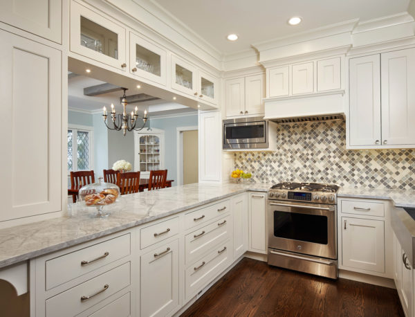 highlight your stainless appliances with all-white cabinets and mosaic tile backsplash