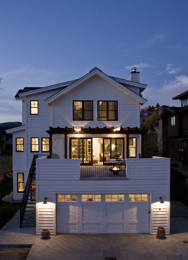 old town white farm house with black clad wood windows