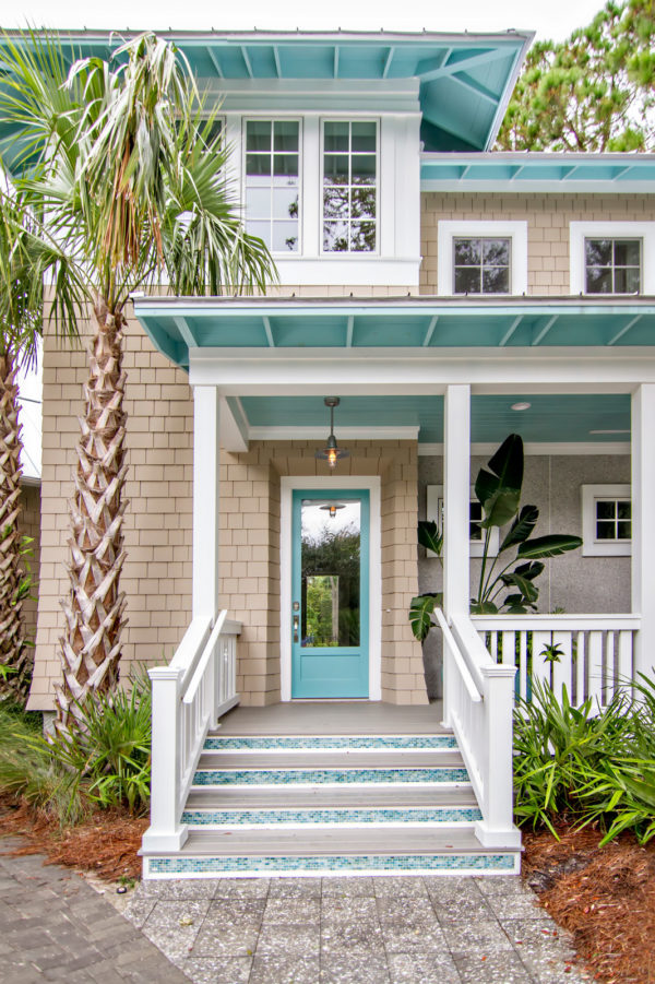 reflecting pool front door in a beige house to evoke tropical beach style