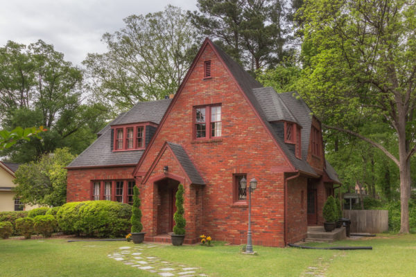 black color shingle roof creates the best quintessential timeless exterior for your red brick house