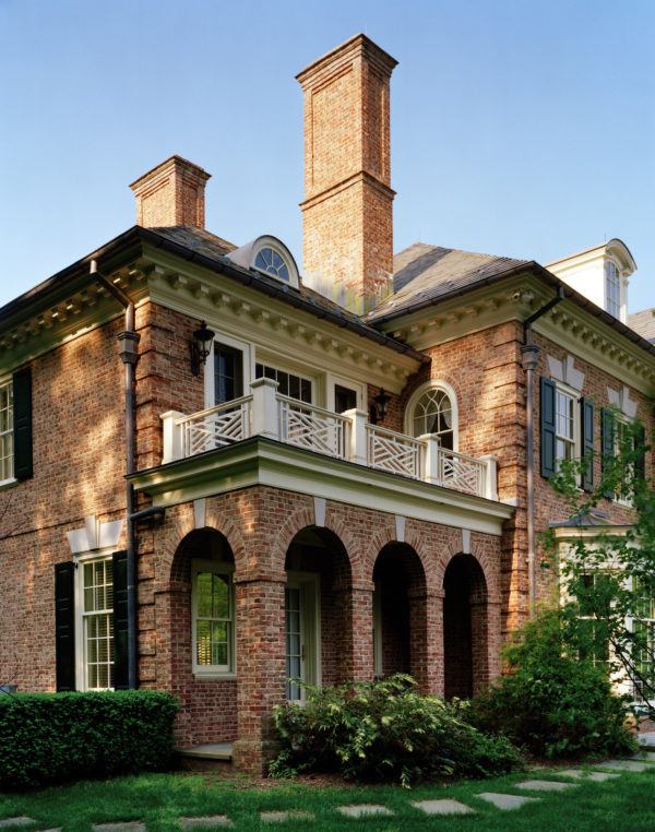 build an elegant and cozy country home with gray slate roof, red brick exterior, and charming architectural features