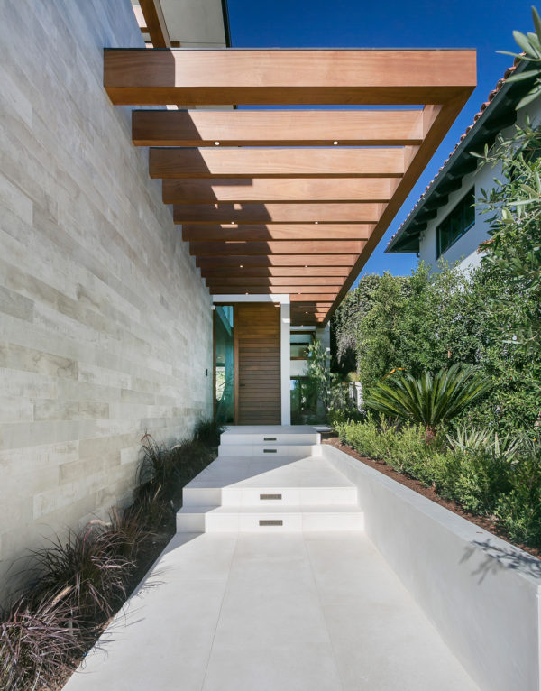 these concrete front steps and walkway showcases a dramatic design idea with unique vibrancy