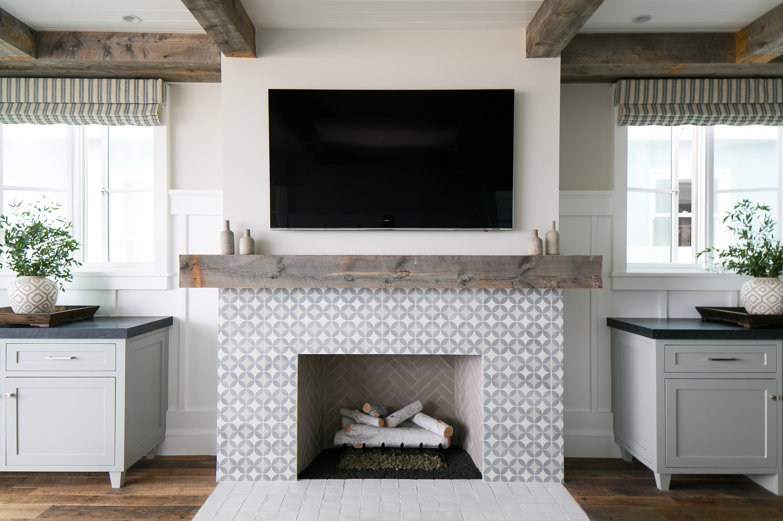 11 Eye Catching Tile In Front Of Fireplace To Fall In Love With   Clean White Tiles In Front Of Cement Mosaic Fireplace Featuring Beige Walls And Wood Flooring 