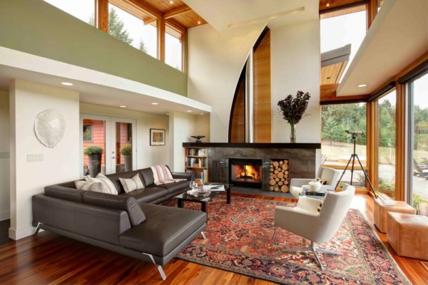 gray tile accent in front of stunning natural fireplace in a contemporary living room design