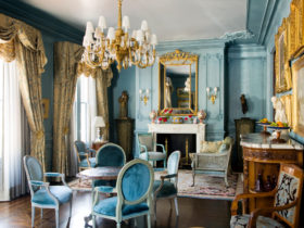 ornate blue furniture and antique gold chandeliers in your living room for history lovers