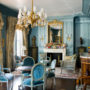 ornate blue furniture and antique gold chandeliers in your living room for history lovers