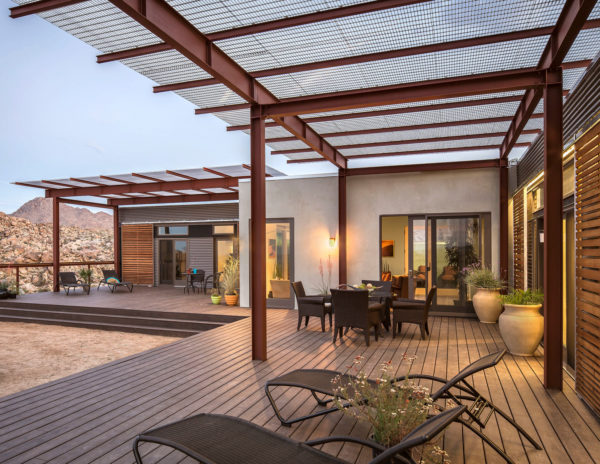 try a metal seam roof for the ultimate contemporary style pergola over a laidback deck