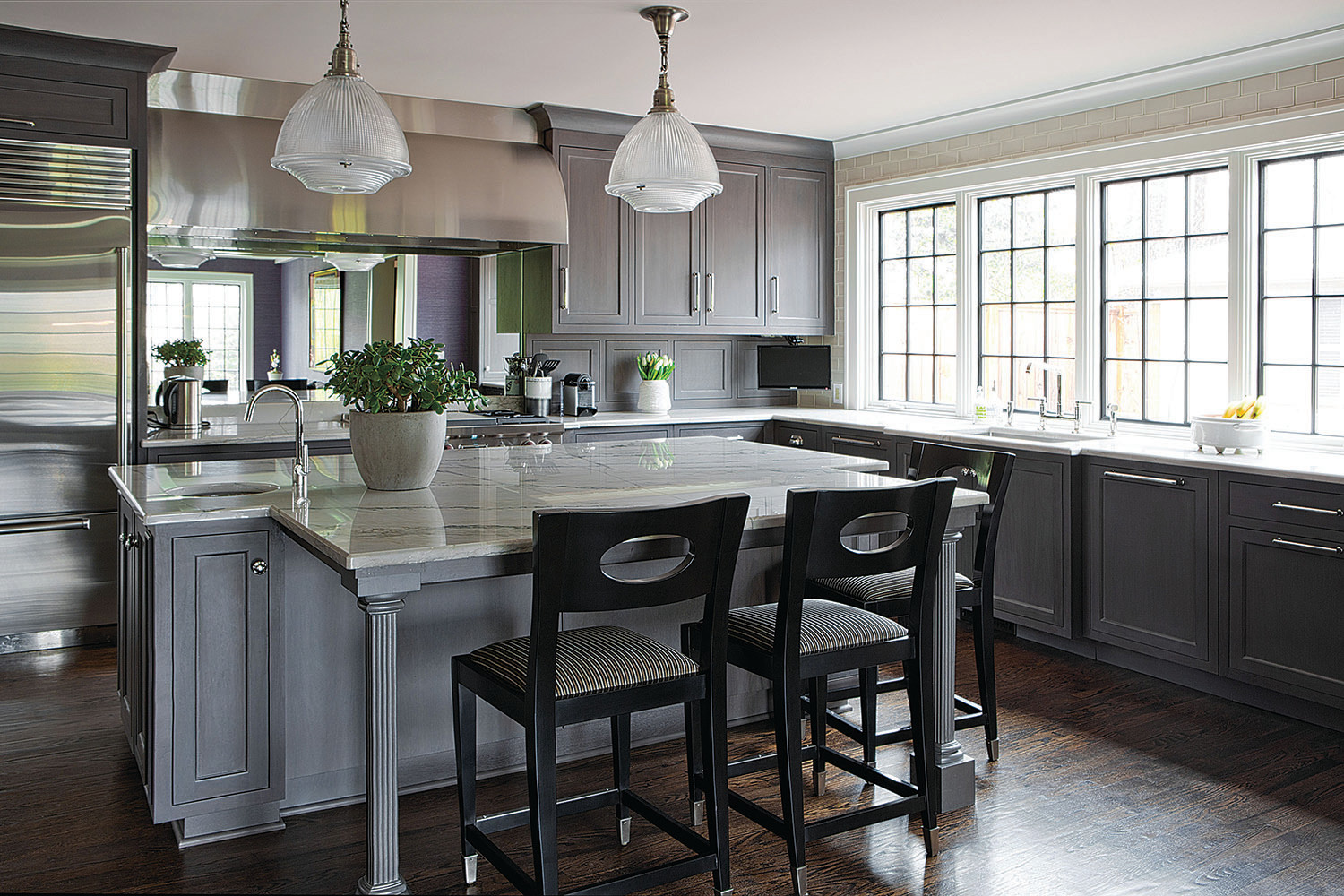 dark grey cabinets with light grey floors