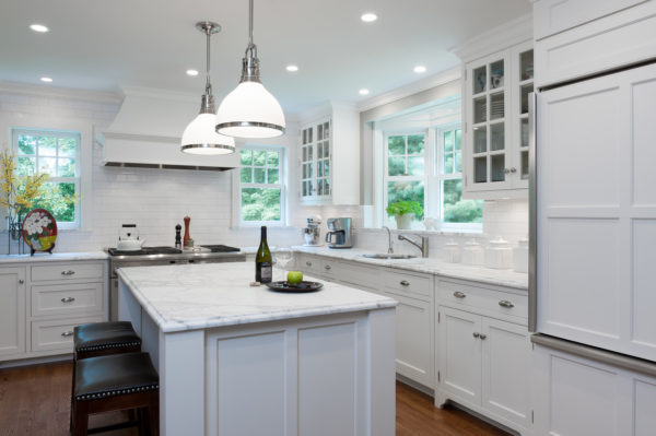embrace white color scheme and andersen’s bay windows over the sink for a stylish modern kitchen interior