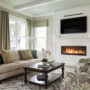 mix medium tone wood and white walls to enhance your linear fireplace with tv above in a comfy suburban home