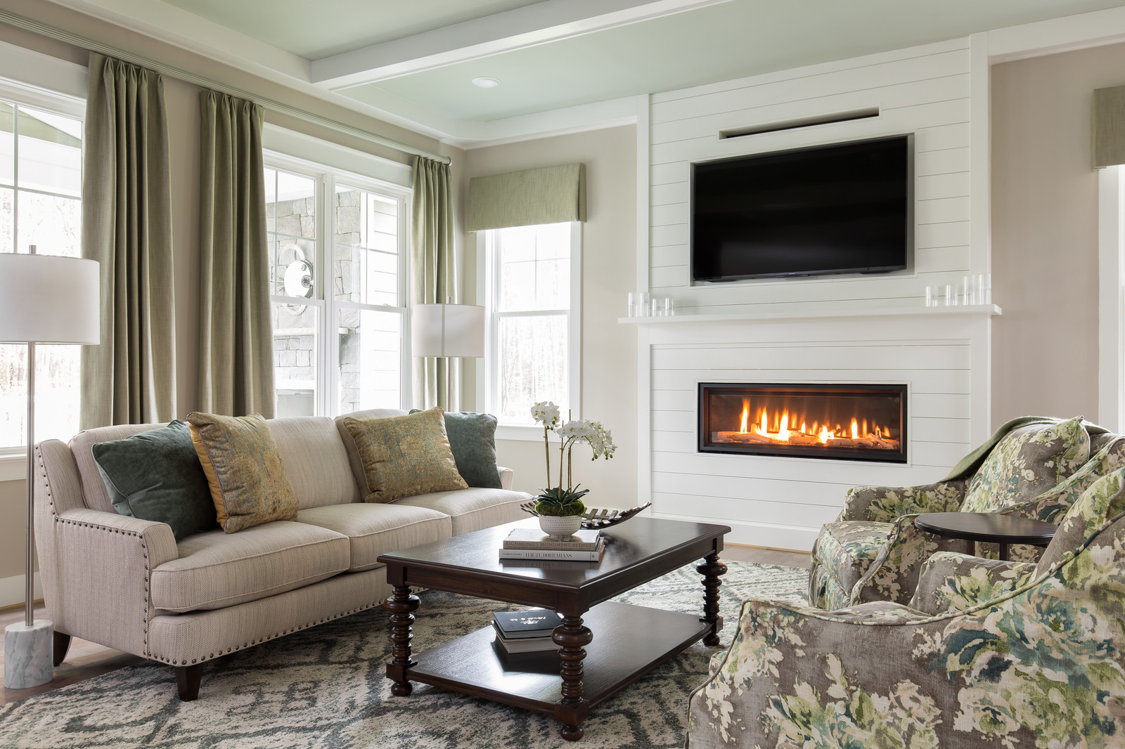 Modern Living Room With Tv Above Fireplace