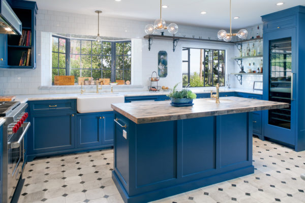 pair your wiry bay window over the sink with wooden decor and attractive skiffkey blue cabinetry