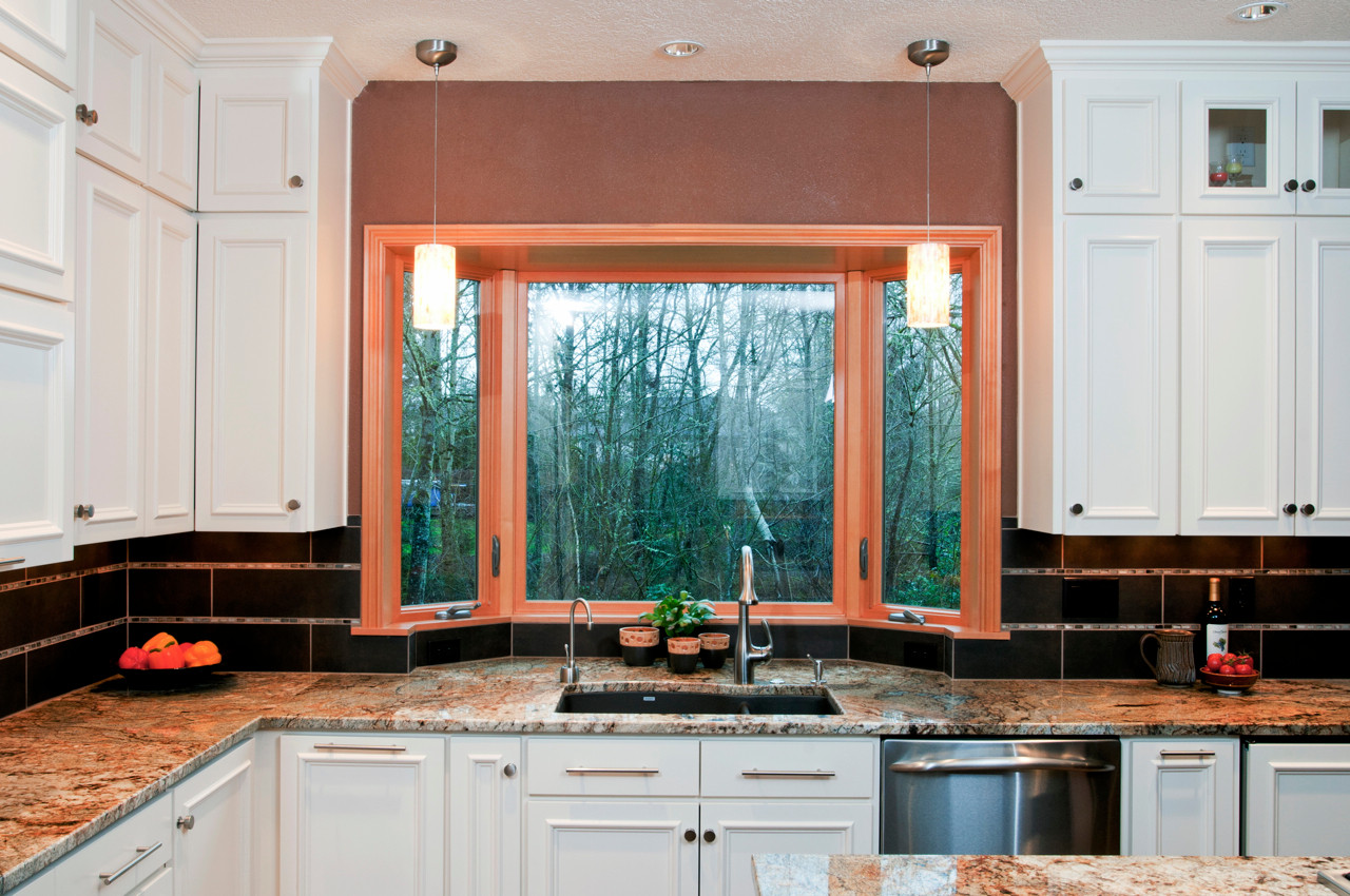 u shaped kitchen with bay window sink