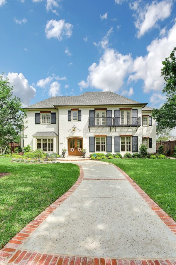 consider a green black shutter color on crisp white house for the best stucco exterior