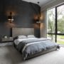 encapsulate contemporary elegance in the bedroom with black walls and grey carpet flooring