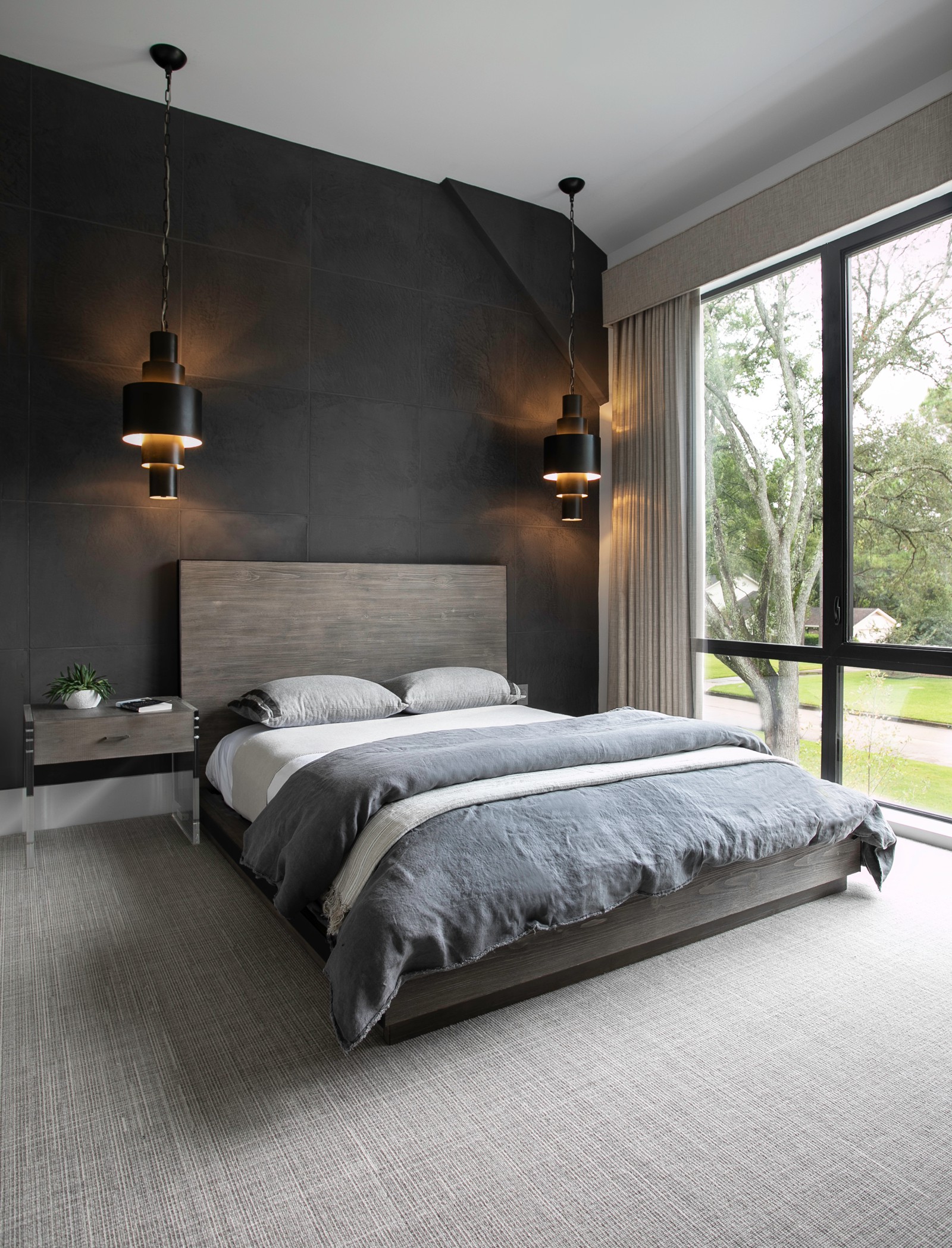 Encapsulate Contemporary Elegance In The Bedroom With Black Walls And Grey Carpet Flooring 