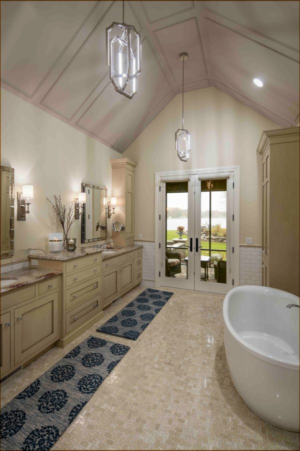 elegant tudor style house interior translates into lavish master bathroom