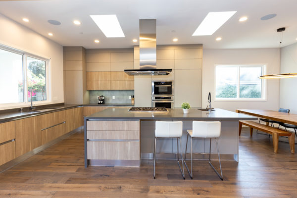 try a spacious kitchen with light brown cabinets and a picnic-style dining area