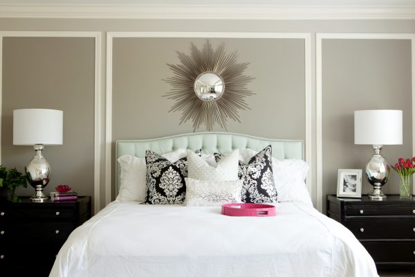 hang a sunburst mirror in the bedroom with collonade gray sw and pavestone walls and white trim for a sophisticated vibe