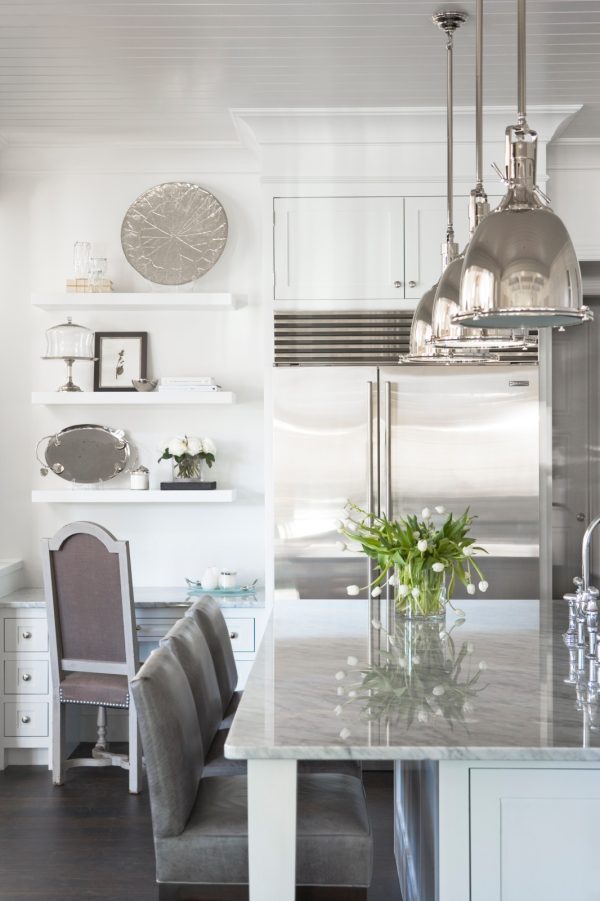 create a contemporary kitchen with benjamin moore winter white cabinets with white carrera marble countertops and stylish steel accents