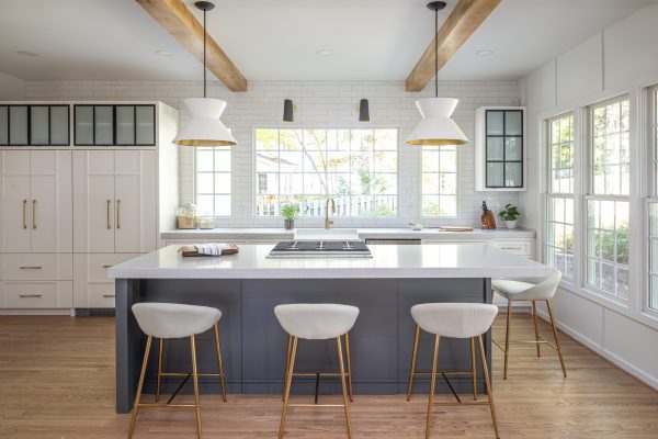 go for a farmhouse interior with white cabinets, white countertops, and natural wood elements