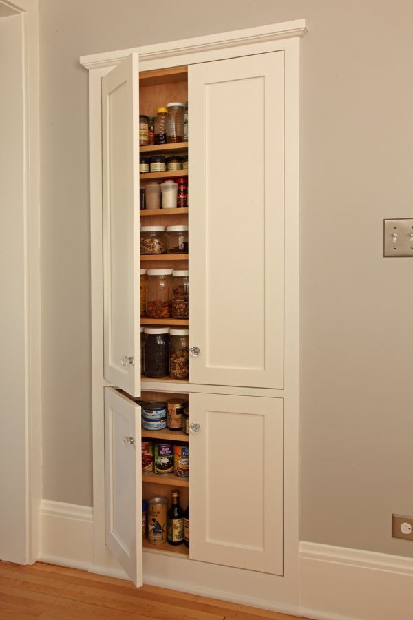 hidden pantry with this recessed wall cabinet between studs to enhance a small kitchen