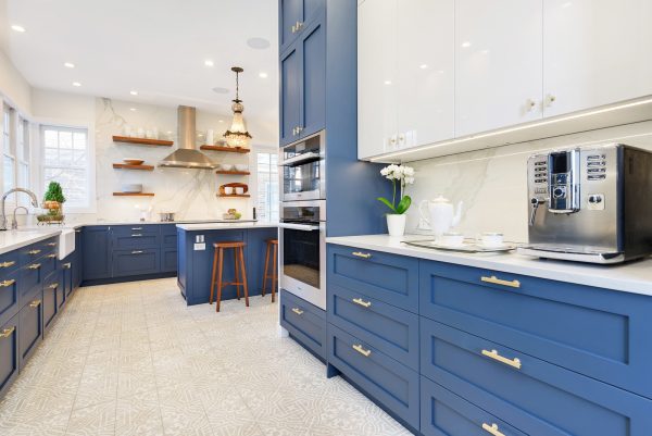 this blue and white kitchen interior looks unique with the intricate white tile floor