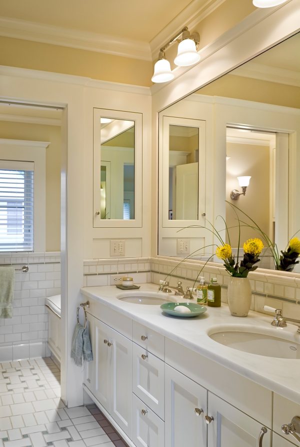 try a sleek and simple recessed wall cabinet between studs for a bright victorian bathroom