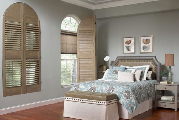 aesthetic shutters for arched half moon windows in a modern and classic bedroom