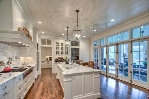 go for an open concept kitchen with french doors with transom that open all the way for a breezy vibe
