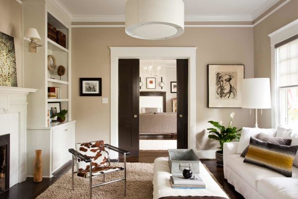 sealskin by sherwin-william make for gorgeous black doors amid white trim and beige walls