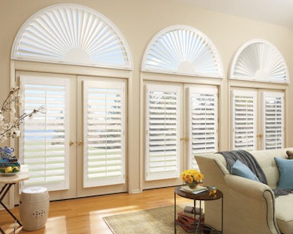 these hunter douglas shutters for arched windows evoke a gorgeous and bright living room ambiance