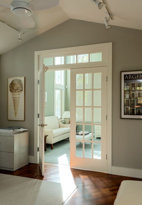use white interior french doors with transom for a sleek home office entrance