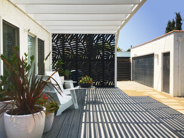 a redwood pergola and screen wall will transform any small backyard into a nifty space with no grass