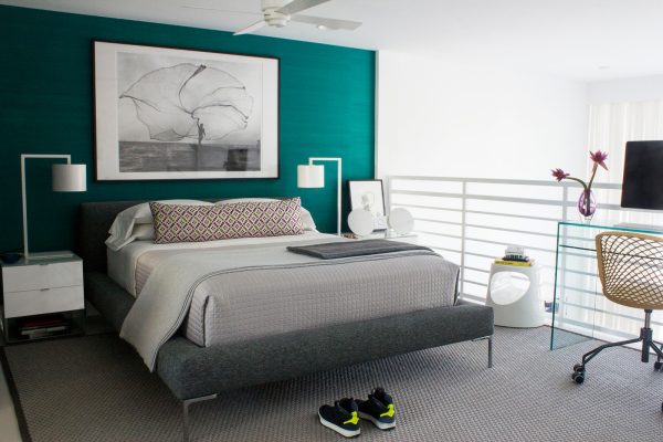 a teal silk accent wall can evoke cool, waterfront vibes in your grey and white bedroom