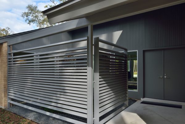 build a privacy gate in sherwin william's dovetail gray for a modern and exquisite-looking blue-gray house