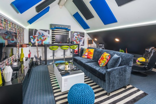 this teen cave uses a trendy yet neutral carpet and white wall color combination