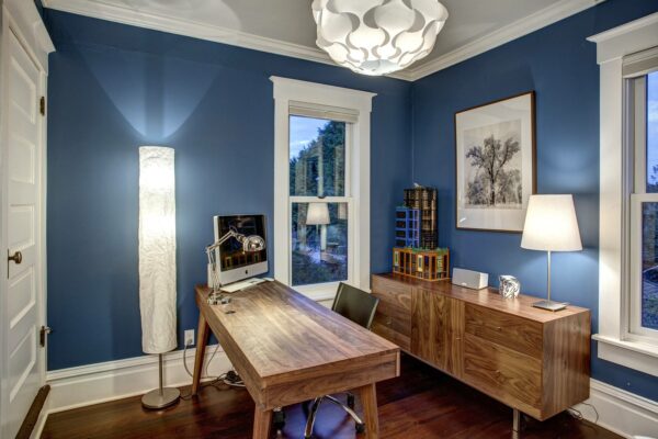 evoke a warm mood in your navy blue office with sherwin williams’ georgian bay 6509 and walnut furniture