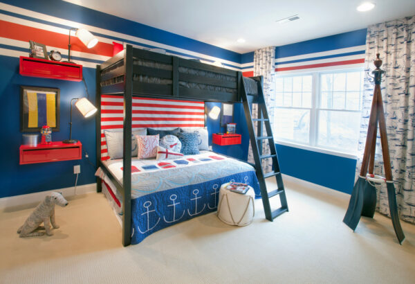 try a playful royal blue kids’ bedroom using sherwin williams’ loyal blue and a sleek black bunk bed