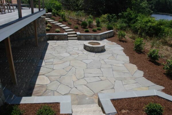 set irregular bluestone on stone dust for a traditional and classic patio design