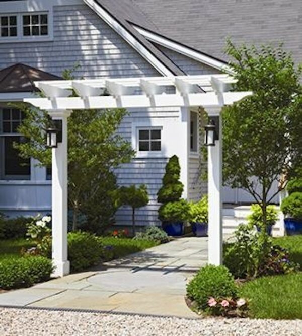 try a cellular pvc front door pergola in prefinished white and pendant lights for an inviting driveway