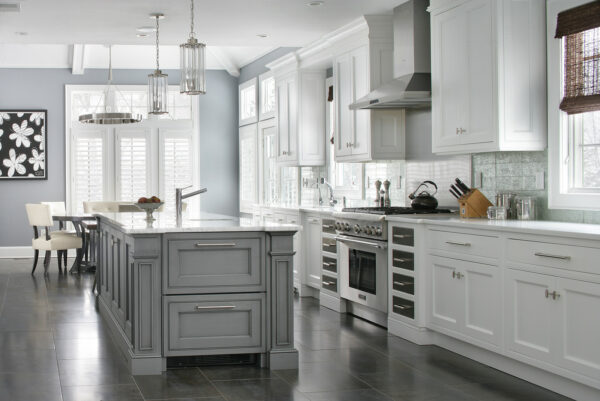 paint your galley kitchen with an island in pewter by benjamin moore and white for a timeless interior style