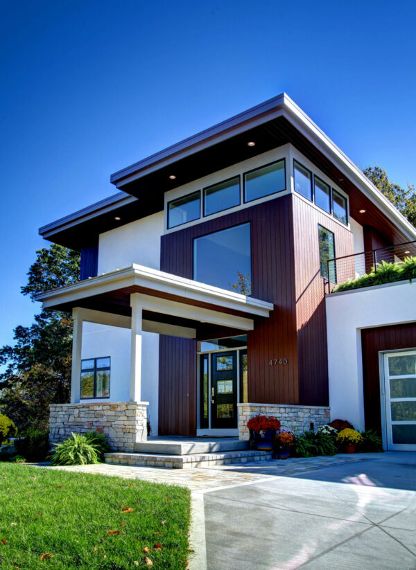 try a flat roof with mixed vertical cedar siding and glass panels for the ultimate contemporary charm
